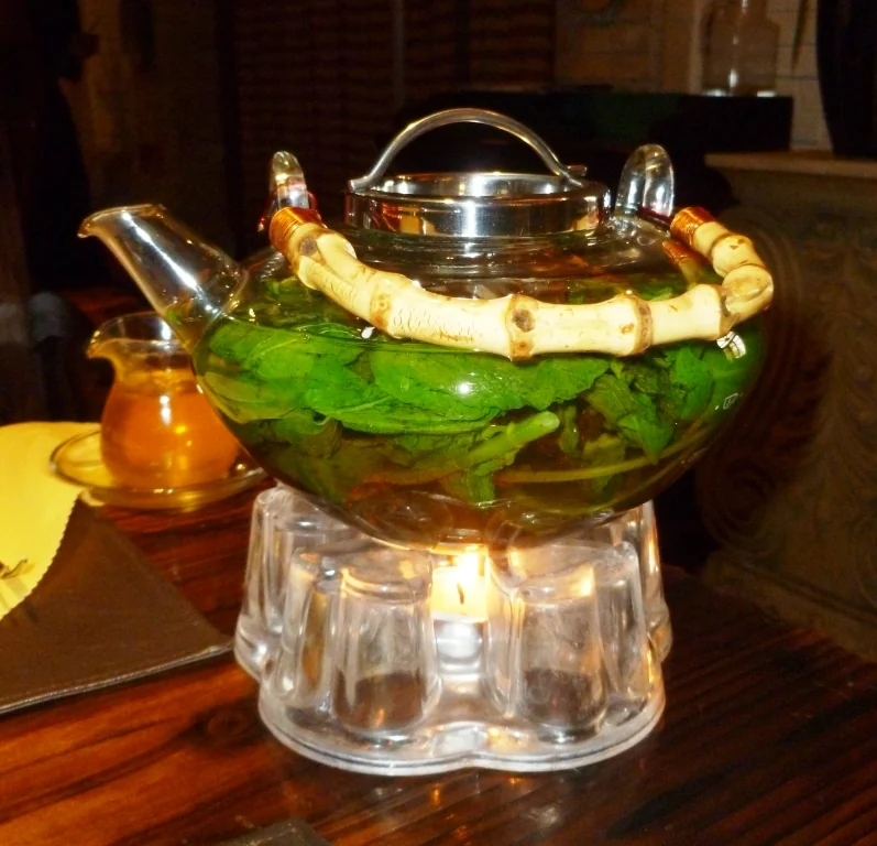 A glass tea kettle in Kashgar. Stay long enough and a picturesque interior begins to reveal a network of regulars.