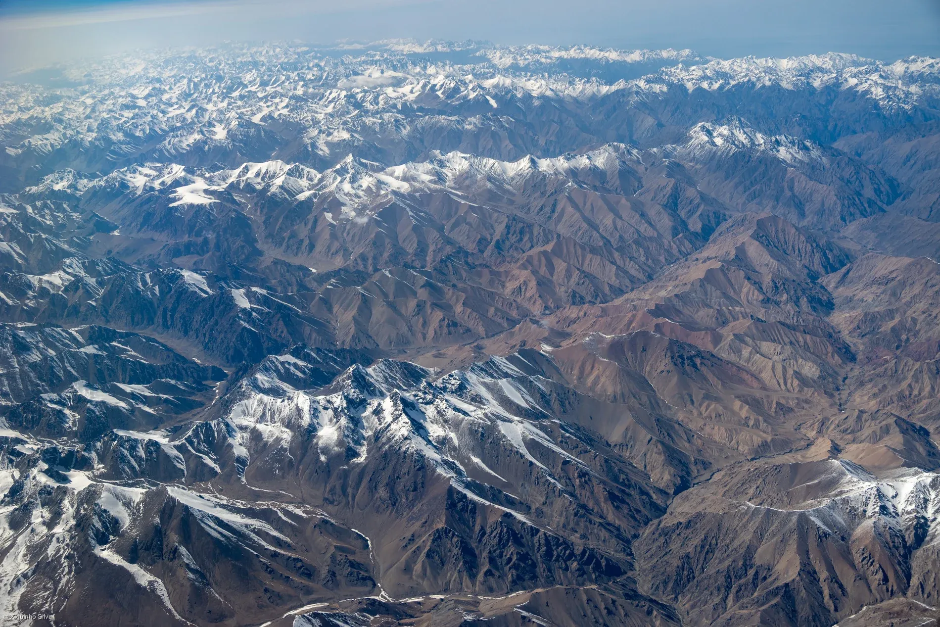 A 2025 real photograph of snow mountains in the Tianshan
