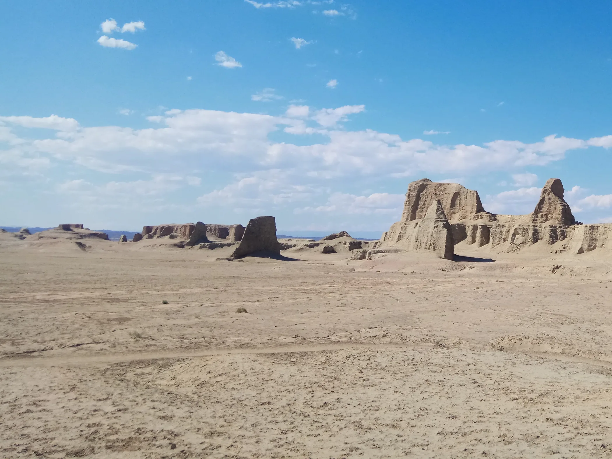 Wind-eroded mesas and residual hills in the Urho yardang, Xinjiang