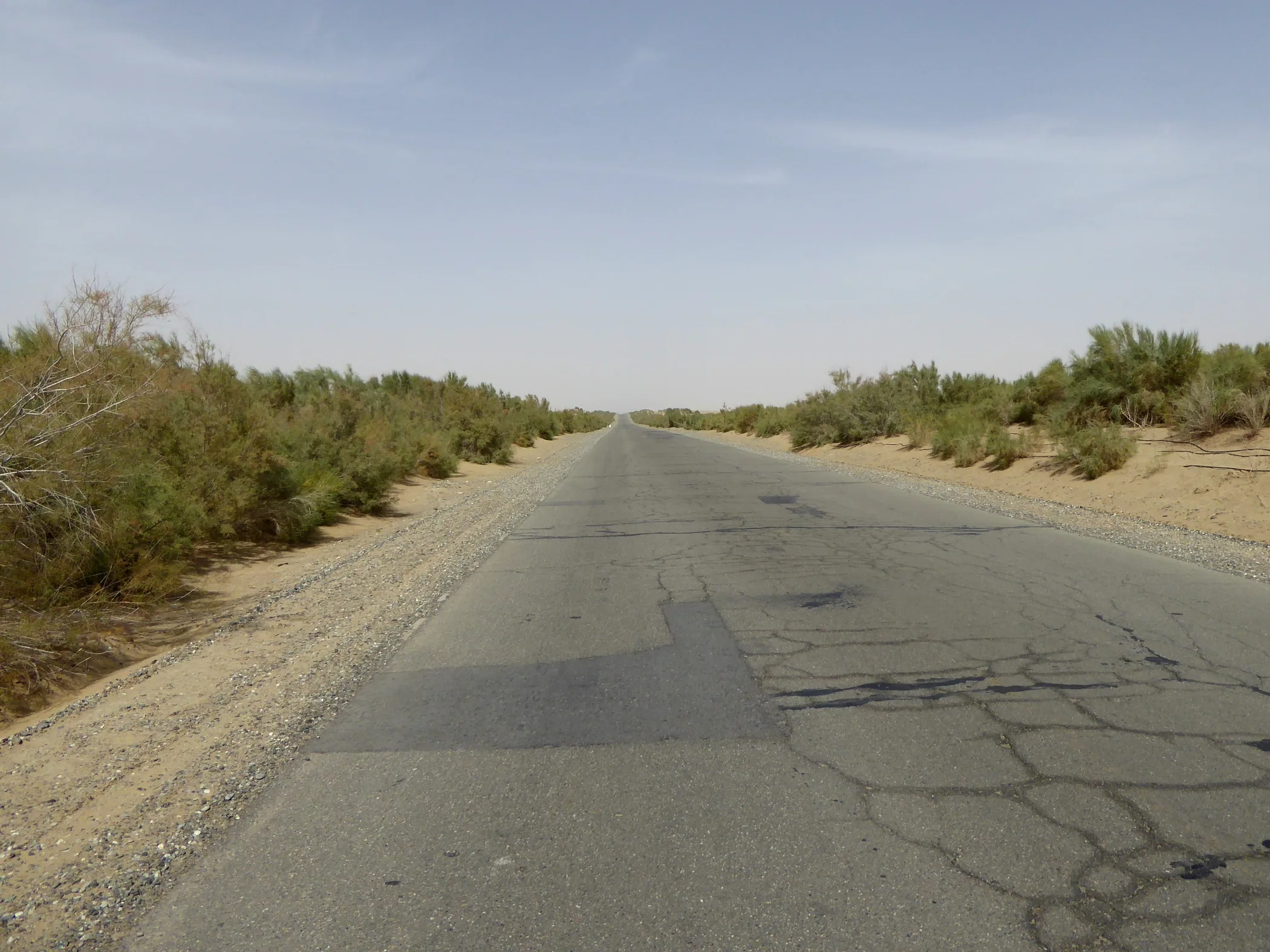 Tarim Desert Highway crossing arid land in the Tarim Basin, Xinjiang