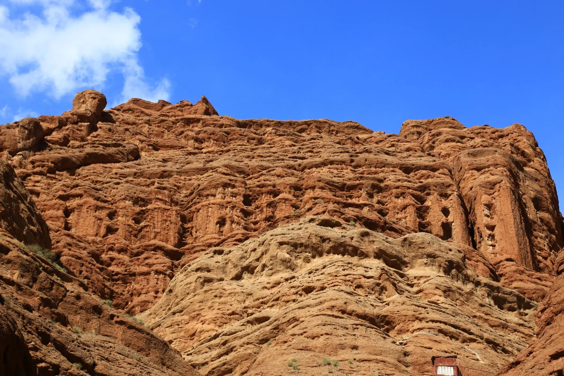 Red-brown rock walls in the Tianshan Mysterious Grand Canyon, Kuqa, Xinjiang